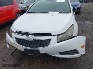 2014 Chevrolet Cruze LS with VIN 1G1PA5SH0E7145168, listed as a IAAI auction lot 41957410 with 151,422 mi miles. Bid and sale history available at carsss.com. Image 13.