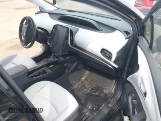 2021 Toyota Prius LE z VIN JTDKAMFP0M3179016, wystawiony jako IAAI lot #42204095 z przebiegiem 34 691 mil mil oraz . Historia ofert i sprzedaży dostępna na DreamBid. Obrazek 5.