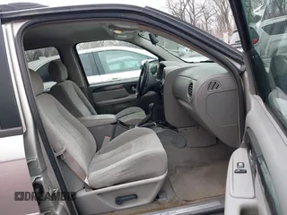 2005 GMC Envoy SLE with VIN 1GKDT13S552332088, listed as a IAAI auction lot 41699178 with 196,869 mi miles. Bid and sale history available at carsss.com. Image 5.
