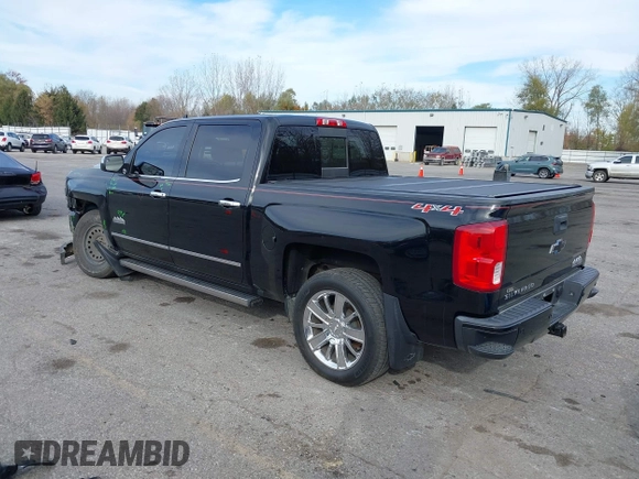 2016 Chevrolet Silverado 1500 High Country with VIN 3GCUKTEC2GG344953, listed as a IAAI auction lot 40700121 with 107,623 mi miles and . Bid and sale history available at DreamBid. Image 3.