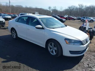 2012 Volkswagen Passat SE with VIN 1VWBP7A38CC020227, listed as a IAAI auction lot 41644536 with 227,205 mi miles. Bid and sale history available at carsss.com. Image 1.