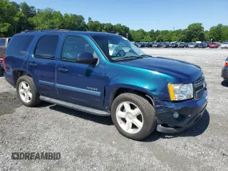 2007 Chevrolet Tahoe LTZ with VIN 1GNFC13J57R181007, listed as a Copart auction lot 56376455 with 202,161 mi miles and Salvage title. Bid and sale history available at DreamBid. Image 4.
