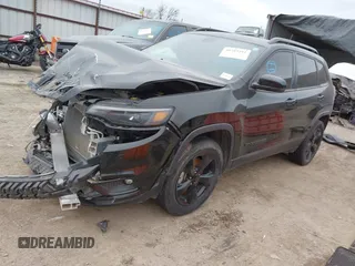 2019 Jeep Cherokee Latitude Plus with VIN 1C4PJMLX5KD432185, listed as a IAAI auction lot 40389491 with 75,703 mi miles and . Bid and sale history available at DreamBid. Image 2.