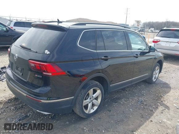 2021 Volkswagen Tiguan SE with VIN 3VV2B7AX4MM050282, listed as a IAAI auction lot 42124808 with 80,082 mi miles and . Bid and sale history available at DreamBid. Image 4.