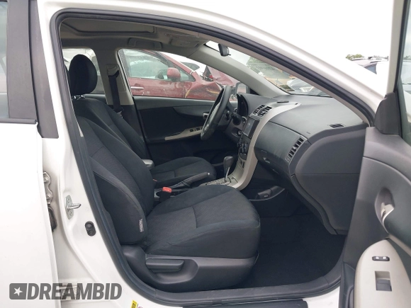 2010 Toyota Corolla with VIN 2T1BU4EEXAC521114, listed as a IAAI auction lot 42066903 with 208,509 mi miles. Bid and sale history available at carsss.com. Image 5.
