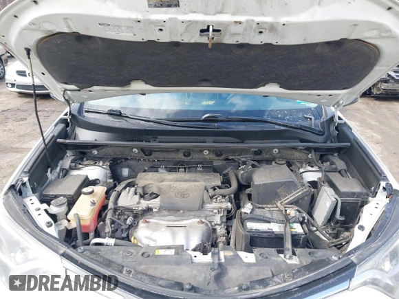 2018 Toyota RAV4 LE with VIN JTMBFREV5JJ738405, listed as a IAAI auction lot 41956145 with 100,593 mi miles and . Bid and sale history available at DreamBid. Image 10.