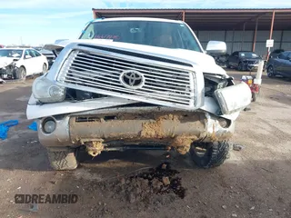 2012 Toyota Tundra 4WD Truck LTD with VIN 5TFHW5F15CX263868, listed as a IAAI auction lot 41669970 with 249,961 mi miles. Bid and sale history available at carsss.com. Image 12.