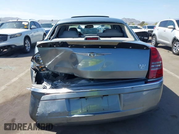 2006 Chrysler 300 C with VIN 2C3KA63H56H313967, listed as a IAAI auction lot 42056998 with 143,592 mi miles and . Bid and sale history available at carsss.com. Image 16.