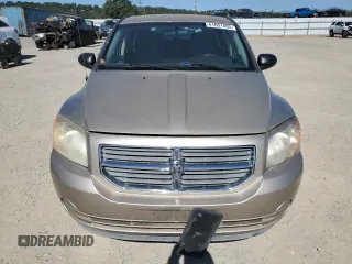 2010 Dodge Caliber SXT z VIN 1B3CB4HA7AD571525, wystawiony jako Copart lot #61651405 z przebiegiem 188 383 mil mil oraz Czysty tytuł • Clean title. Historia ofert i sprzedaży dostępna na DreamBid. Obrazek 5.