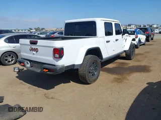 2023 Jeep Gladiator Mojave z VIN 1C6JJTEG7PL536582, wystawiony jako IAAI lot #42074073 z przebiegiem 34 262 mil mil oraz . Historia ofert i sprzedaży dostępna na DreamBid. Obrazek 4.