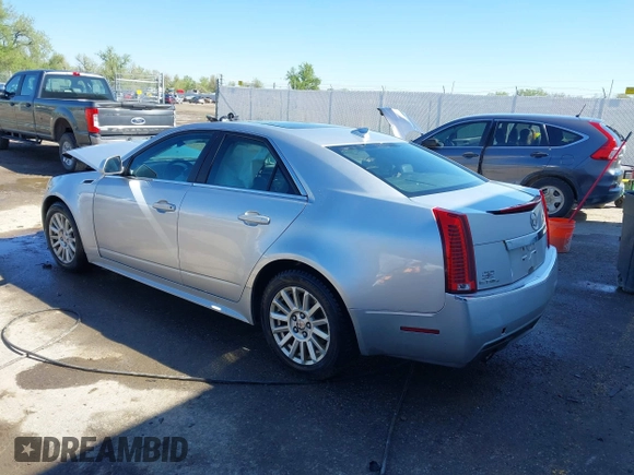 2012 Cadillac CTS with VIN 1G6DC5E55C0133032, listed as a IAAI auction lot 42189802 with 196,482 mi miles and . Bid and sale history available at DreamBid. Image 3.