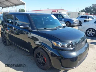 2010 Scion xB with VIN JTLZE4FE3A1104050, listed as a IAAI auction lot 41627322 with 150,118 mi miles. Bid and sale history available at carsss.com. Image 1.