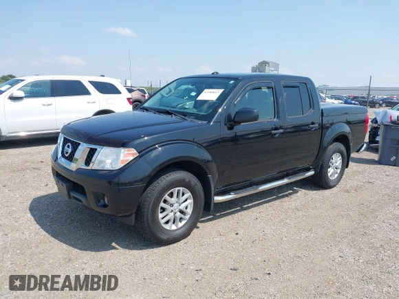 2018 Nissan Frontier Pro-4X with VIN 1N6AD0EV4JN721288, listed as a IAAI auction lot 42180613 with 80,984 mi miles and . Bid and sale history available at DreamBid. Image 2.