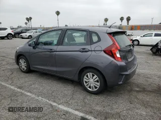 2015 Honda Fit LX z VIN 3HGGK5H58FM785137, wystawiony jako Copart lot #59013315 z przebiegiem 84 592 mil mil oraz Szkoda całkowita • Salvage title. Historia ofert i sprzedaży dostępna na DreamBid. Obrazek 2.