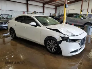2019 Mazda 3 z VIN 3MZBPABL4KM114291, wystawiony jako Copart lot #57652945 z przebiegiem 148 644 mil mil oraz Szkoda całkowita • Salvage title. Historia ofert i sprzedaży dostępna na DreamBid. Obrazek 4.