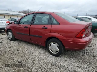 2003 Ford Focus LX with VIN 1FAFP33P13W228550, listed as a Copart auction lot 84184084 with 128,196 mi miles and Non Repairable. Bid and sale history available at DreamBid. Image 2.