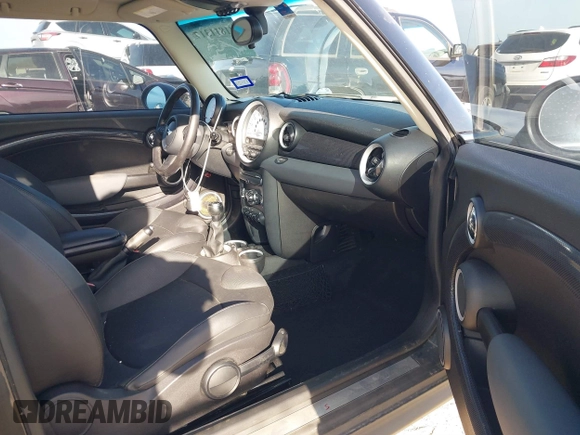 2012 MINI Hardtop S with VIN WMWSV3C5XCTY26065, listed as a IAAI auction lot 41811317 with 74,858 mi miles and . Bid and sale history available at DreamBid. Image 5.