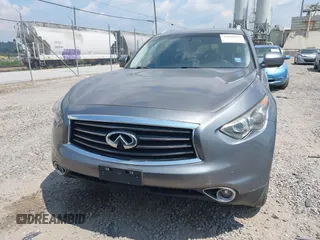 2014 Infiniti QX70 with VIN JN8CS1MW5EM411653, listed as a IAAI auction lot 42690935 with 110,806 mi miles and . Bid and sale history available at DreamBid. Image 12.