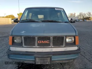1986 GMC Safari z VIN 1GDDM15Z1GB521872, wystawiony jako Copart lot #87655995 z przebiegiem 30 889 mil mil oraz Szkody całkowita. Historia ofert i sprzedaży dostępna na DreamBid. Obrazek 5.