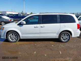 2016 Dodge Grand Caravan SXT with VIN 2C4RDGCG2GR390001, listed as a IAAI auction lot 41943622 with 127,328 mi miles. Bid and sale history available at carsss.com. Image 14.