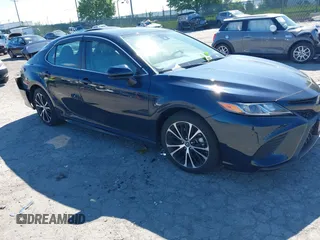 2019 Toyota Camry LE z VIN 4T1B11HK6KU283500, wystawiony jako IAAI lot #42210003 z przebiegiem 34 037 mil mil oraz . Historia ofert i sprzedaży dostępna na DreamBid. Obrazek 1.