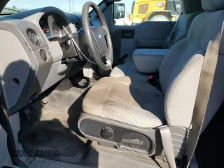 2007 Ford F-150 STX with VIN 1FTRX12W97FA65608, listed as a Copart auction lot 83752084 with 121,052 mi miles and Salvage Title. Bid and sale history available at DreamBid. Image 7.