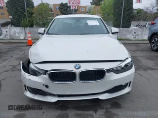 2015 BMW 3 Series 320i with VIN WBA3B1C5XFK137171, listed as a IAAI auction lot 41736278 with 28,673 mi miles. Bid and sale history available at carsss.com. Image 12.