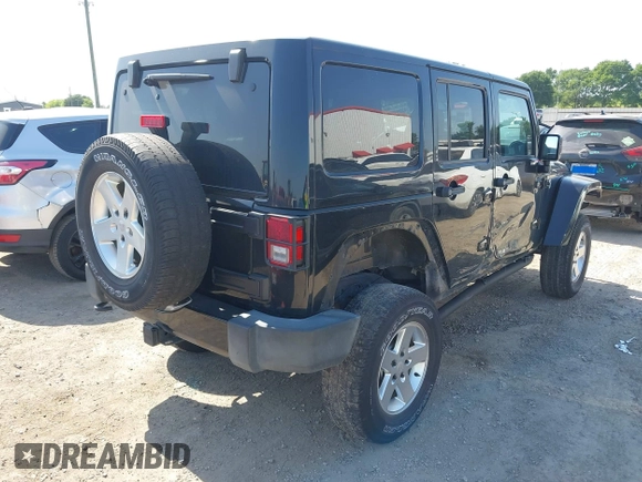 2015 Jeep Wrangler Unlimited Sahara with VIN 1C4BJWEG0FL717536, listed as a IAAI auction lot 42004096 with 90,802 mi miles and . Bid and sale history available at DreamBid. Image 4.