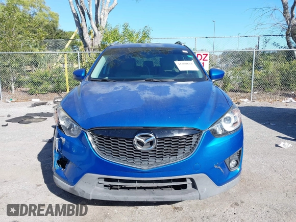 2014 Mazda CX-5 Touring with VIN JM3KE2CYXE0310873, listed as a IAAI auction lot 41309633 with 175,325 mi miles and . Bid and sale history available at DreamBid. Image 13.