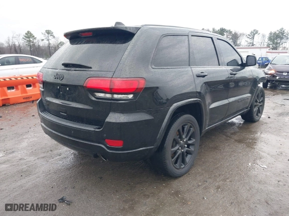 2021 Jeep Grand Cherokee Laredo X with VIN 1C4RJEAG1MC680282, listed as a IAAI auction lot 41466496 with 58,855 mi miles. Bid and sale history available at carsss.com. Image 4.