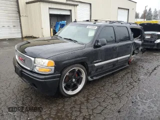 2003 GMC Yukon XL SLT with VIN 3GKEC16T33G129827, listed as a Copart auction lot 85144844 with Not Provided miles and Salvage Title. Bid and sale history available at carsss.com. Image 1.
