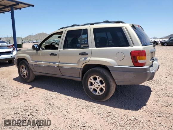2001 Jeep Grand Cherokee Laredo with VIN 1J4GX48S81C548944, listed as a Copart auction lot 62779405 with 122,594 mi miles and Clean title. Bid and sale history available at DreamBid. Image 2.