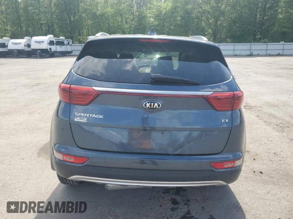2018 Kia Sportage EX z VIN KNDPNCAC7J7442678, wystawiony jako Copart lot #55504735 z przebiegiem Nie podano mil oraz Szkoda całkowita • Salvage title. Historia ofert i sprzedaży dostępna na DreamBid. Obrazek 6.