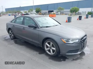 2013 Audi A6 2.0T Premium with VIN WAUCFAFC3DN043093, listed as a IAAI auction lot 42043576 with 136,592 mi miles. Bid and sale history available at carsss.com. Image 1.