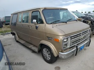 1989 Chevrolet Chevy Van z VIN 1GBEG25K2K7120100, wystawiony jako Copart lot #75508934 z przebiegiem Nie podano mil oraz Szkody całkowita. Historia ofert i sprzedaży dostępna na DreamBid. Obrazek 4.