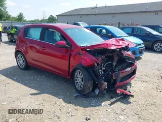 2012 Chevrolet Sonic LT with VIN 1G1JC6SH7C4135418, listed as a IAAI auction lot 42464564 with 169,035 mi miles and . Bid and sale history available at DreamBid. Image 1.