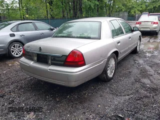 2010 Mercury Grand Marquis LS z VIN 2MEBM7FV5AX606629, wystawiony jako IAAI lot #42345444 z przebiegiem 66 600 mil mil oraz . Historia ofert i sprzedaży dostępna na DreamBid. Obrazek 4.