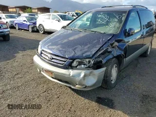 2001 Toyota Sienna LE with VIN 4T3ZF13C91U355926, listed as a Copart auction lot 88992805 with 130,397 mi miles and Salvage title. Bid and sale history available at DreamBid. Image 12.
