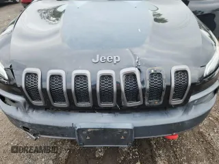 2014 Jeep Cherokee Trailhawk with VIN 1C4PJMBS3EW127928, listed as a Copart auction lot 63825865 with 172,712 mi miles and Salvage title. Bid and sale history available at DreamBid. Image 12.