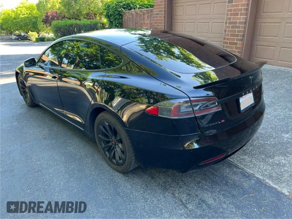 2017 Tesla Model S 60 with VIN 5YJSA1E15HF219286, listed as a Copart auction lot 57360515 with 44,520 mi miles and Salvage title. Bid and sale history available at DreamBid. Image 3.