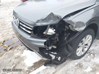 2018 Volkswagen Tiguan S with VIN 3VV0B7AX1JM143571, listed as a IAAI auction lot 41555436 with 72,545 mi miles. Bid and sale history available at carsss.com. Image 6.