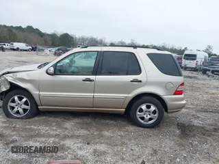 2003 Mercedes-Benz M-Class 3.2L with VIN 4JGAB54E43A383811, listed as a IAAI auction lot 41204136 with 209,327 mi miles. Bid and sale history available at carsss.com. Image 14.