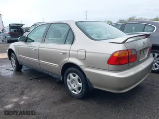 2000 Honda Civic EX with VIN 1HGEJ8643YL000579, listed as a IAAI auction lot 41947054 with 144,508 mi miles. Bid and sale history available at carsss.com. Image 3.