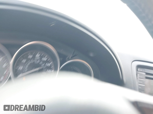 2015 Mazda CX-5 Touring with VIN JM3KE2CY2F0461935, listed as a IAAI auction lot 41430070 with 220,857 mi miles and . Bid and sale history available at DreamBid. Image 7.