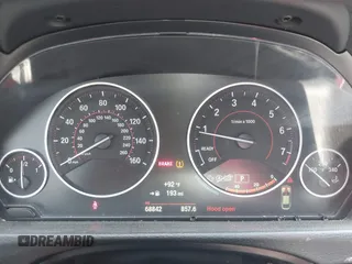 2015 BMW 4 Series 428i with VIN WBA4A5C59FG052596, listed as a IAAI auction lot 42649927 with 68,842 mi miles and . Bid and sale history available at DreamBid. Image 7.