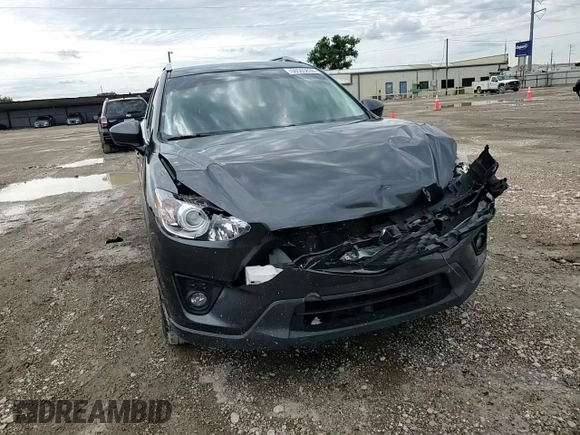 2014 Mazda CX-5 Touring z VIN JM3KE2CY7E0308580, wystawiony jako Copart lot #60565835 z przebiegiem 92 708 mil mil oraz Szkoda całkowita • Salvage title. Historia ofert i sprzedaży dostępna na DreamBid. Obrazek 14.