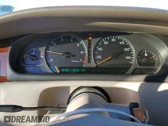 2002 Cadillac Eldorado z VIN 1G6EL12Y12B100821, wystawiony jako Copart lot #83495214 z przebiegiem 36 358 mil mil oraz Czysty tytuł • Clean title. Historia ofert i sprzedaży dostępna na DreamBid. Obrazek 9.