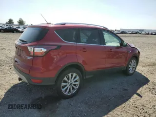2017 Ford Escape Titanium with VIN 1FMCU9JD6HUB14799, listed as a Copart auction lot 54431685 with 75,454 mi miles and Salvage Title. Bid and sale history available at carsss.com. Image 3.
