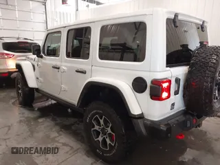 2022 Jeep Wrangler Unlimited Rubicon z VIN 1C4HJXFG7NW106446, wystawiony jako IAAI lot #41405202 z przebiegiem 39 755 mil mil oraz . Historia ofert i sprzedaży dostępna na DreamBid. Obrazek 3.
