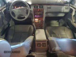 2000 Mercedes-Benz E-Class AWD with VIN WDBJF82J1YX029676, listed as a Copart auction lot 79412174 with 96,324 mi miles and Clean Title. Bid and sale history available at carsss.com. Image 8.